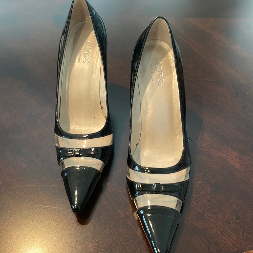 Ladies Black patent leather heel. Clear see thru. Size 6.5 Never worn.